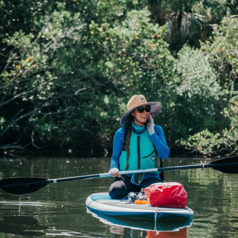 a person rowing a boat in the water