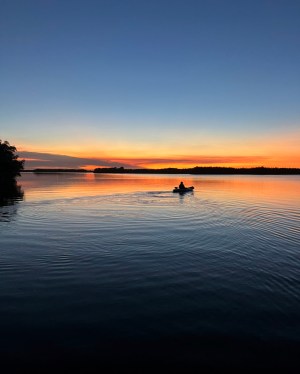 a sunset over a body of water
