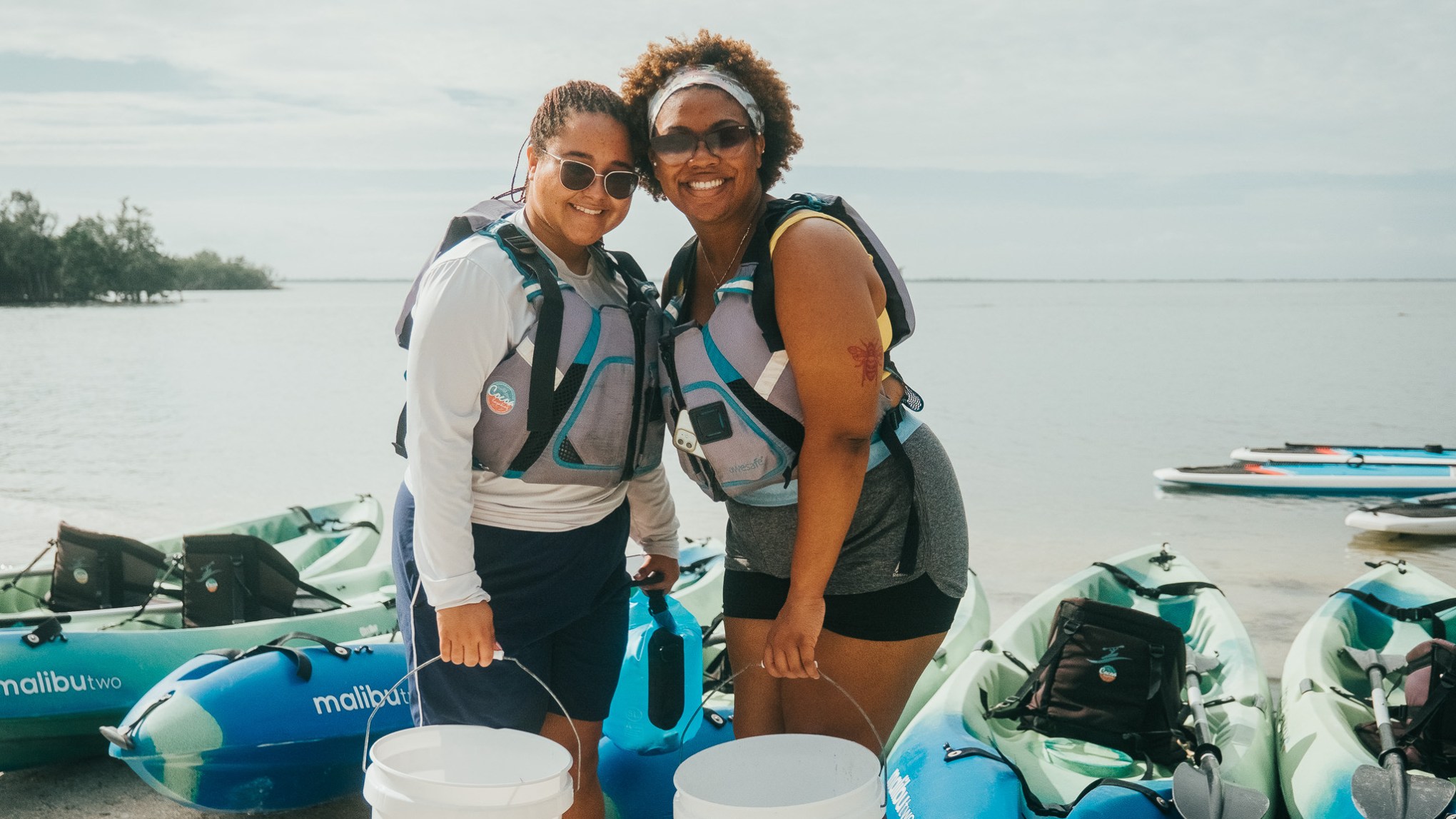 IMG_7324 a man and a woman sitting on a boat
