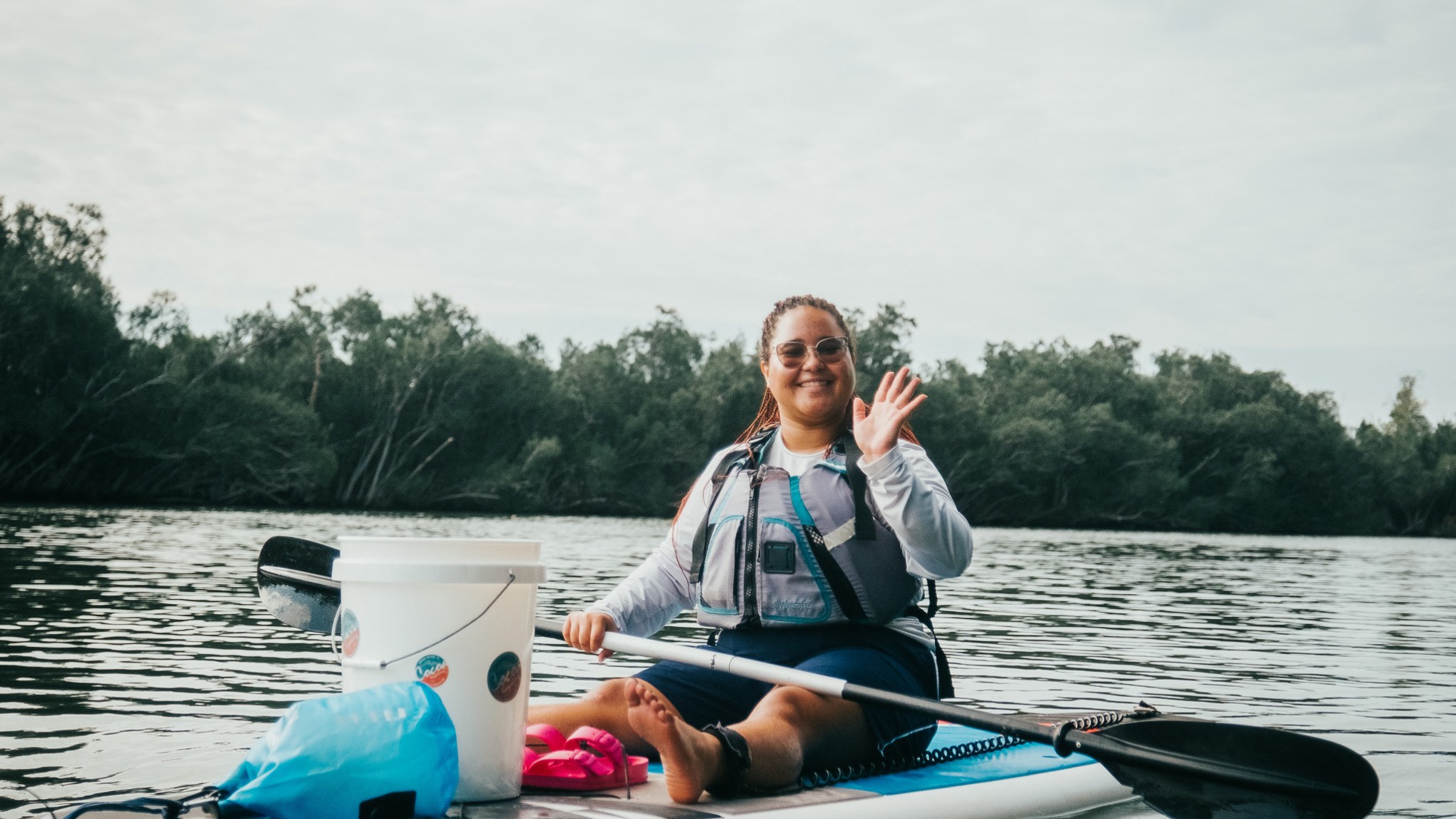 a person rowing a boat in the water