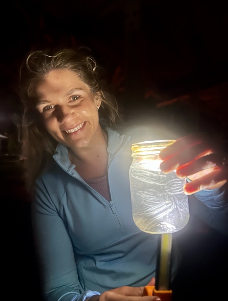 a woman holding a wine glass